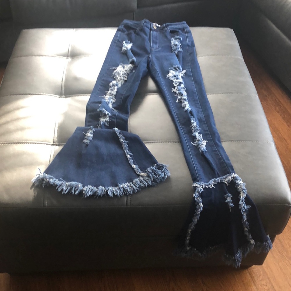 Flared and Ripped Leg Jeans